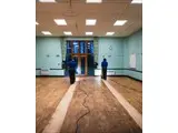Main Hall during resurface by Total Floor Care