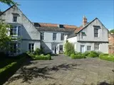 View of house with River Skell behind