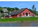 Calstock Village Hall viewed from the Devon Bank